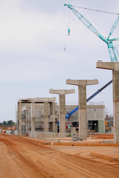 construction-site-by-road-against-sky_1048944-21790060